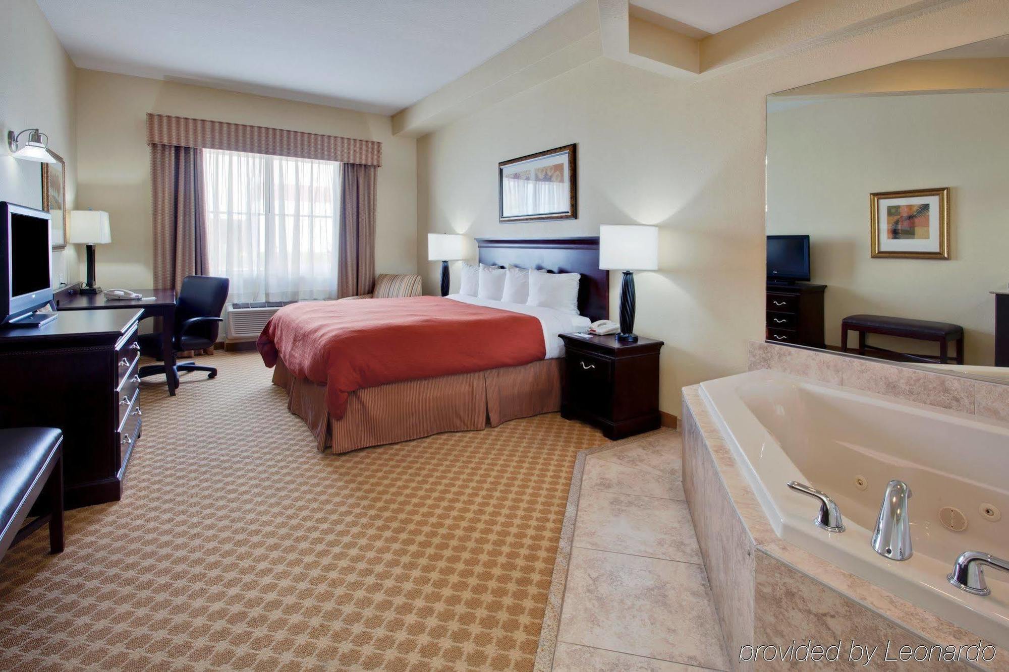 Country Inn & Suites By Radisson, Port Charlotte, Fl Quarto foto